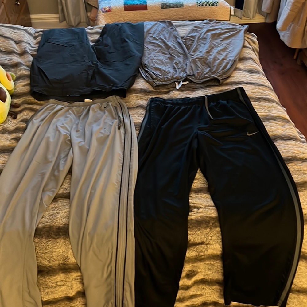 Lot of 4 pair of mens workout/warmup/athletic pants. 3 Nike and 1 Adidas